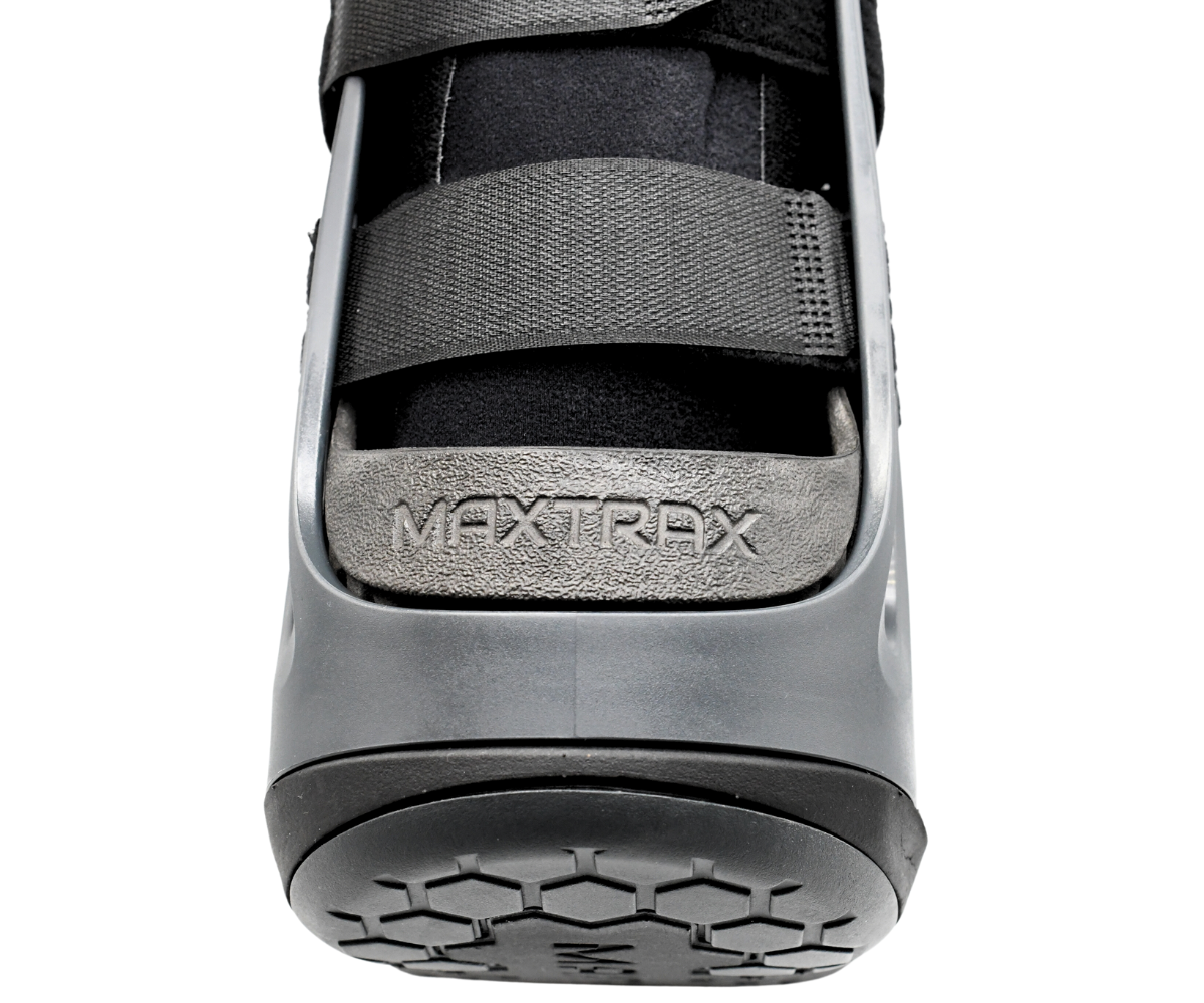 DJO PROCARE MAXTRAX™ 2.0 Ankle Air Pneumatic Walker Boot. Low profile footbed, non-slip rocker bottom sole promote natural gait & shock absorption.